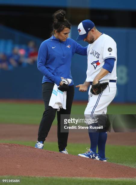 Toronto Blue Jays starting pitcher Marco Estrada leaves the game injured in the first inning as the Toronto Blue Jays play the New York Mets at...