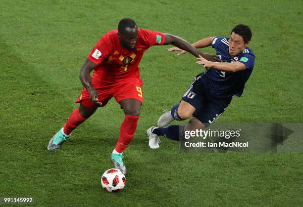 Shinji Okazaki of Japan vies with Romelu Lukaku of Belgium during the 2018 FIFA World Cup Russia Round of 16 match between Belgium and Japan at...