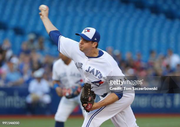 Jake Petricka of the Toronto Blue Jays delivers a pitch in the second inning during MLB game action against the New York Mets at Rogers Centre on...
