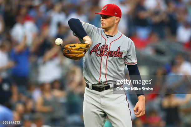 Sean Newcomb of the Atlanta Braves reacts after giving up a home run to Kyle Higashioka of the New York Yankees in the second inning at Yankee...