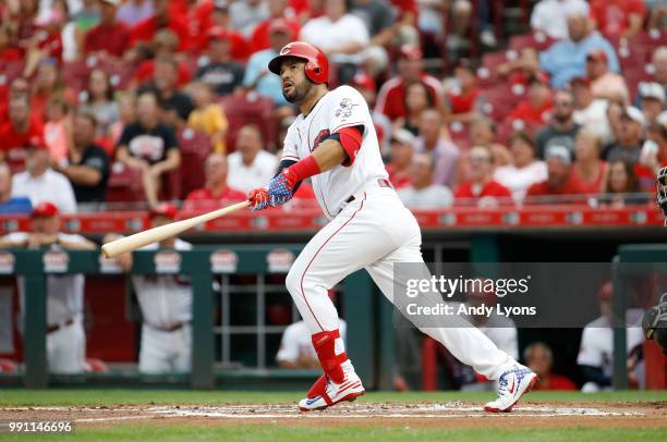 Eugenio Suarez of the Cincinnati Reds hits a two run homerun in the first inning against the Chicago White Sox at Great American Ball Park on July 3,...