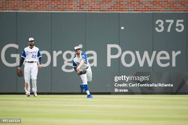 Ender Inciarte of the Atlanta Braves throws to the cut-off man against the Baltimore Orioles at SunTrust Park on June 23, 2018 in Atlanta, Georgia....