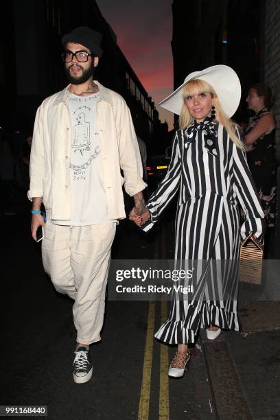 Leyman Lahcine and Paloma Faith seen attending HENI Gallery x adidas: #prouder - private view on July 3, 2018 in London, England.