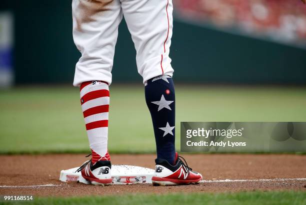 Jose Peraza of the Cincinnati Reds stands on third base in the first inning against the Chicago White Sox at Great American Ball Park on July 3, 2018...
