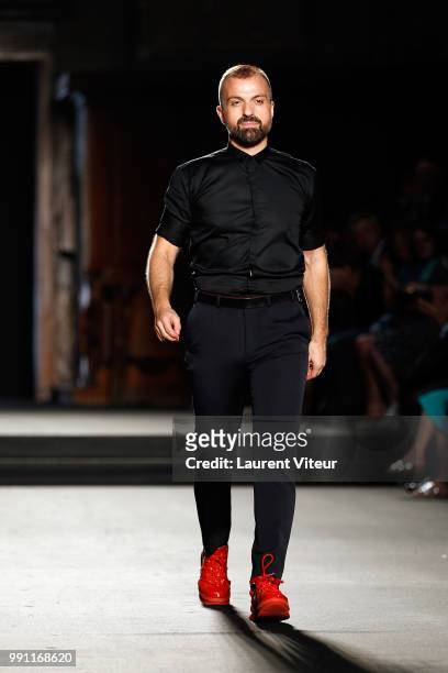 Designer Julien Fournie walks the runway during the Julien Fournie Haute Couture Fall Winter 2018/2019 show as part of Paris Fashion Week on July 3,...