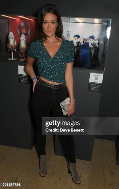 Dakota attends adidas 'Prouder': A Fat Tony Project in aid of the Albert Kennedy Trust, supporting LGBT youth, at Heni Gallery Soho on July 3, 2018...