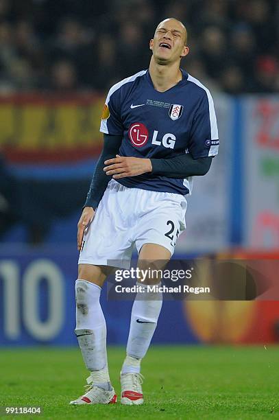 Bobby Zamora of Fulham reacts in pain during the UEFA Europa League final match between Atletico Madrid and Fulham at HSH Nordbank Arena on May 12,...