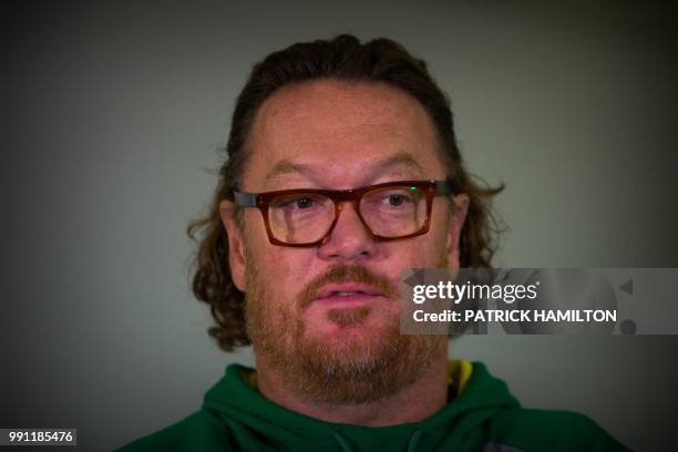 Australian basketball assistant coach Luc Longley attends a press conference at Brisbane airport on July 4 two days after their FIBA World Cup Asian...