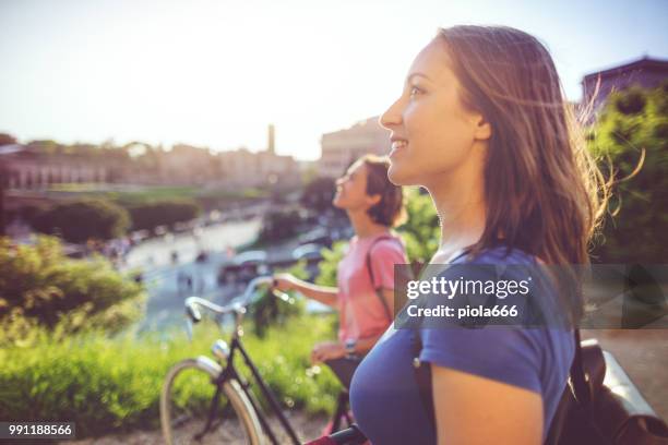 tourist women in rome: by the coliseum - 666 stock pictures, royalty-free photos & images