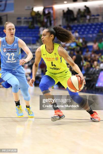 Skylar Diggins-Smith of the Dallas Wings drives against Courtney Vandersloot of the Chicago Sky on July 3, 2018 at College Park Center in Arlington,...