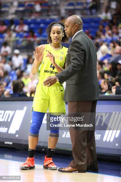 Head Coach Fred Williams of the Dallas Wings speaks with Skylar Diggins-Smith of the Dallas Wings during the game against the Chicago Sky on July 3,...