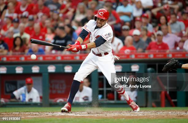 Billy Hamilton of the Cincinnati Reds hits the ball in the fifth inning against the Chicago White Sox at Great American Ball Park on July 3, 2018 in...