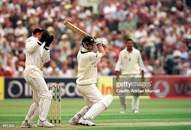 Mark Waugh of Australia is caught by Alec Stewart of England off the ball of Andrew Caddick during the second day of the England v Australia first...