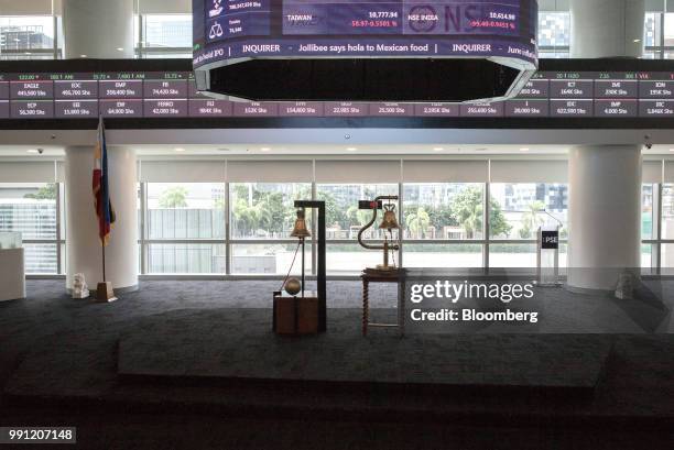 Bells stand on the trading floor of the Philippine Stock Exchange in Bonifacio Global City , Metro Manila, the Philippines, on Monday, July 2, 2018....