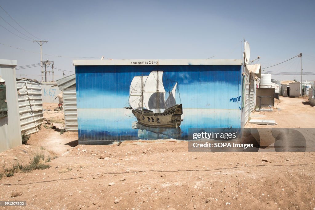Beautiful artwork covers the walls of the shelters in Za...