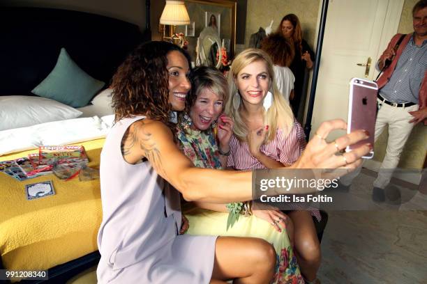 Annabelle Mandeng, Leonie Bechtoldt and Tanja Buelter during the Klambt Style Cocktail at HENRI Hotel on July 3, 2018 in Berlin, Germany.