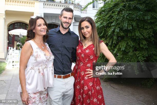 Gitta Saxx, Pedro De Melo and Anastasia Zampounidis during the Klambt Style Cocktail at HENRI Hotel on July 3, 2018 in Berlin, Germany.