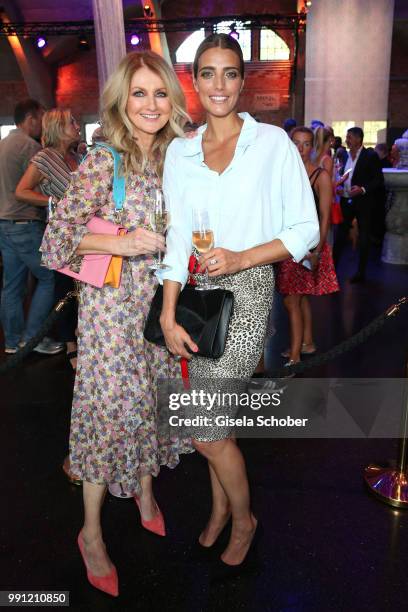 Frauke Ludowig and Marvy Rieder during the Marc Cain Fashion Show Spring/Summer 2019 at WEEC, Westhafen, on July 3, 2018 in Berlin, Germany.