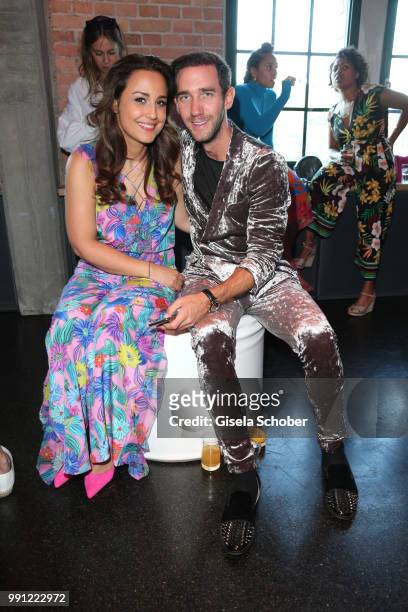 Nina Moghaddam and Marcel Remus during the Marc Cain Fashion Show Spring/Summer 2019 at WEEC, Westhafen, on July 3, 2018 in Berlin, Germany.