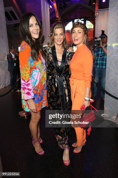 Bettina Zimmermann , Marie Baeumer and Annemarie Carpendale during the Marc Cain Fashion Show Spring/Summer 2019 at WEEC, Westhafen, on July 3, 2018...