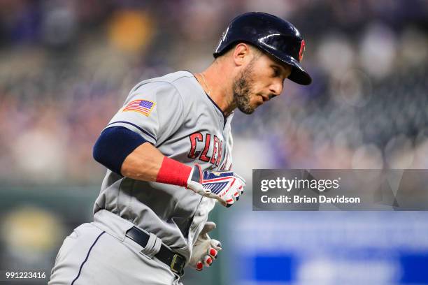 Yan Gomes of the Cleveland Indians runs the bases after hitting a grand slam home run against the Kansas City Royals during the sixth inning at...