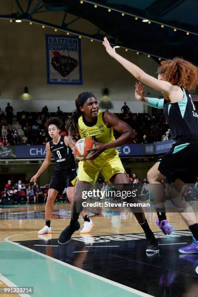 Crystal Langhorne of the Seattle Storm handles the ball against the New York Liberty on July 3, 2018 at Westchester County Center in White Plains,...