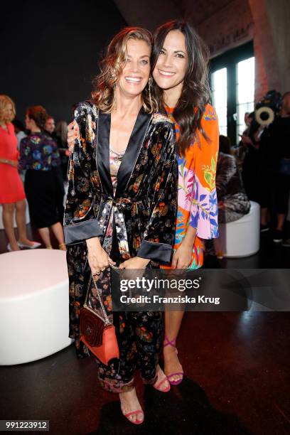 Marie Baeumer and Bettina Zimmermann during the Marc Cain Fashion Show Spring/Summer 2019 at WECC on July 3, 2018 in Berlin, Germany.