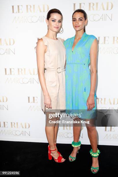 Isabeli Fontana and Talia Graf attend the Marc Cain Fashion Show Spring/Summer 2019 at WECC on July 3, 2018 in Berlin, Germany.