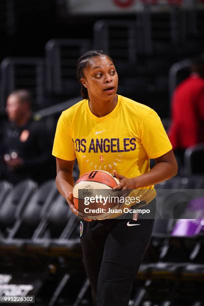 Odyssey Sims of the Los Angeles Sparks handles the ball before the game against the Connecticut Sun on July 3, 2018 at STAPLES Center in Los Angeles,...