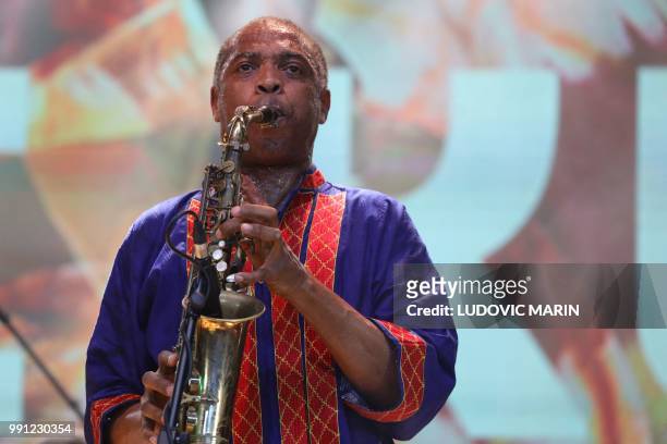 Nigerian musician Femi Kuti performs at the Afrika Shrine in Lagos on July 3, 2018. - French President Emmanuel Macron has arrived in Abuja for a...