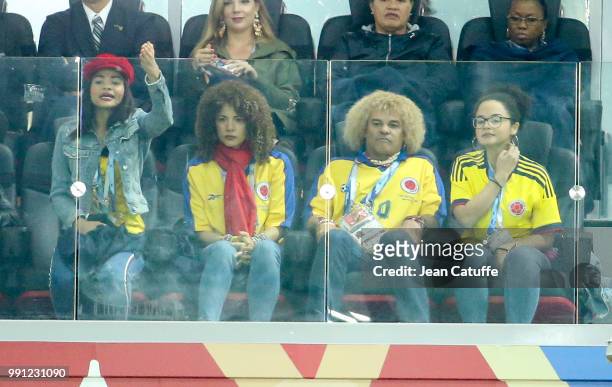 Colombia's football legend Carlos Valderrama, his wife Elvira Redondo and daughters attend the 2018 FIFA World Cup Russia Round of 16 match between...