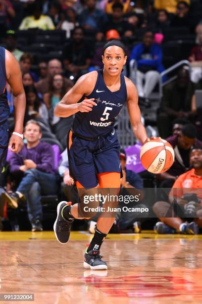 Jasmine Thomas of the Connecticut Sun handles the ball against the Los Angeles Sparks on July 3, 2018 at STAPLES Center in Los Angeles, California....