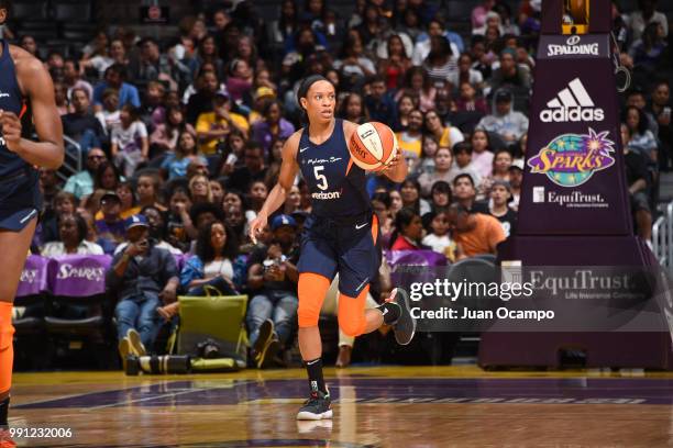 Jasmine Thomas of the Connecticut Sun handles the ball against the Los Angeles Sparks on July 3, 2018 at STAPLES Center in Los Angeles, California....