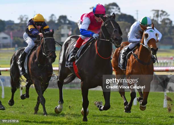 Craig Williams riding Legale winning Race 3 during Melbourne Racing at Sandown Hillside on July 4, 2018 in Melbourne, Australia.