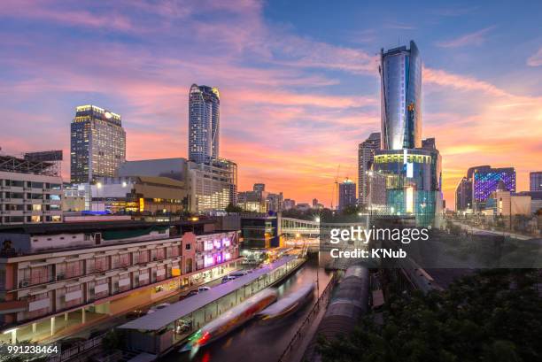 skyscraper, skyline and boat transportation in canal at pratunam, downtown of bangkok thailand in sunset time - k'nub stock pictures, royalty-free photos & images