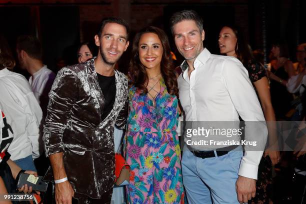 Marcel Remus, Nina Moghaddam and Christian Polanc during the Marc Cain Fashion Show Spring/Summer 2019 at WECC on July 3, 2018 in Berlin, Germany.