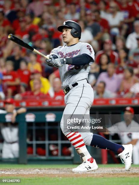 Avisail Garcia of the Chicago White Sox hits a home run in the ninth inning against the Cincinnati Reds at Great American Ball Park on July 3, 2018...