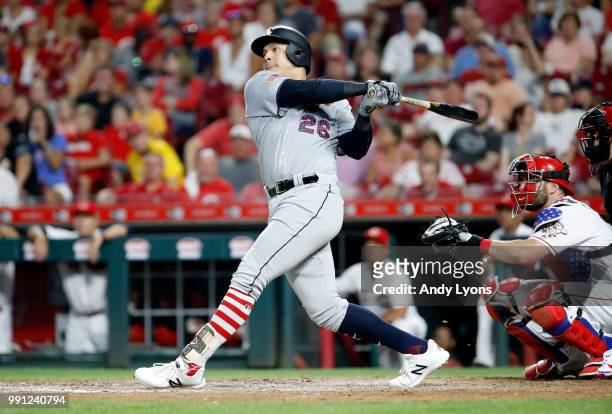 Avisail Garcia of the Chicago White Sox hits a home run in the ninth inning against the Cincinnati Reds at Great American Ball Park on July 3, 2018...