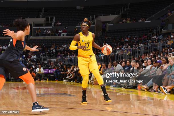 Essence Carson of the Los Angeles Sparks handles the ball against the Connecticut Sun on July 3, 2018 at STAPLES Center in Los Angeles, California....