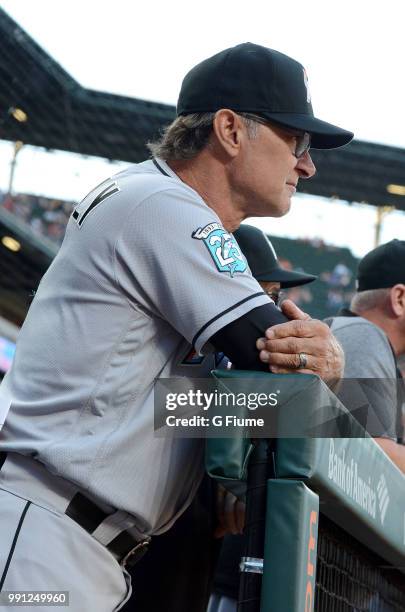 Manager Don Mattingly of the Miami Marlins watches the game in the second inning against the Baltimore Orioles at Oriole Park at Camden Yards on June...