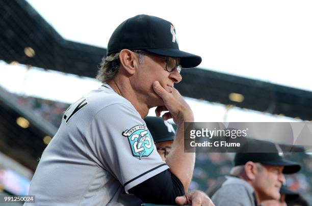 Manager Don Mattingly of the Miami Marlins watches the game in the second inning against the Baltimore Orioles at Oriole Park at Camden Yards on June...