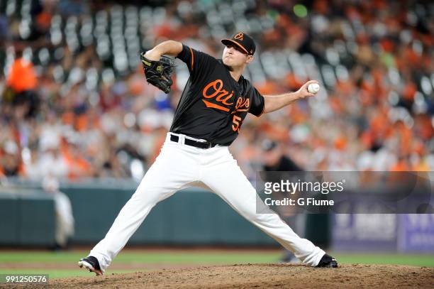 Zach Britton of the Baltimore Orioles pitches in the eighth inning against the Miami Marlins at Oriole Park at Camden Yards on June 15, 2018 in...