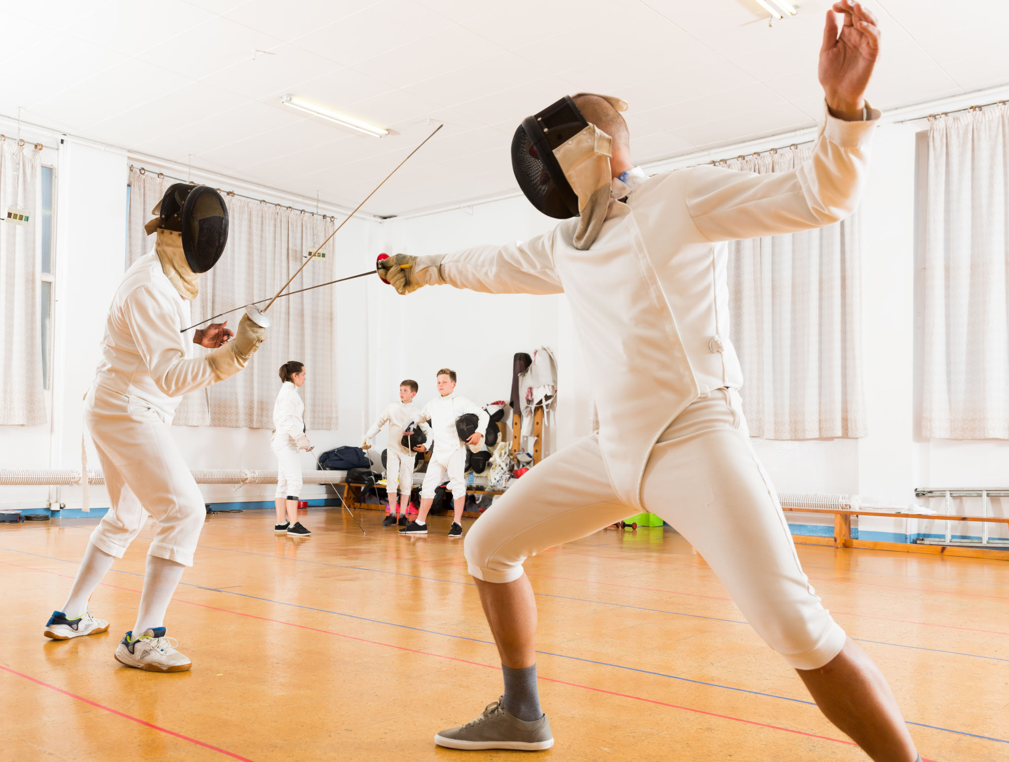 fencing coach