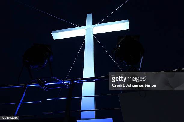 The monumental main cross, symbolizing the Christian faith, is illuminated during dusk of day 1 of the 2nd Ecumenical Church Day at the...