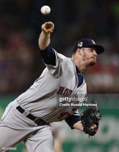 Chris Devenski of the Houston Astros throws against the Texas Rangers at Globe Life Park in Arlington on July 3, 2018 in Arlington, Texas.