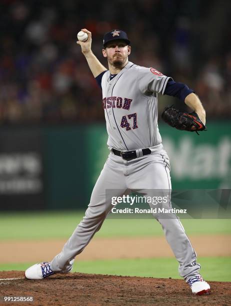 Chris Devenski of the Houston Astros throws against the Texas Rangers at Globe Life Park in Arlington on July 3, 2018 in Arlington, Texas.