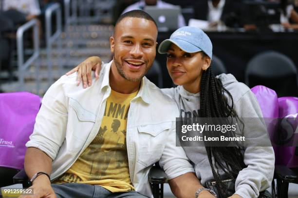 DeVon Franklin and actress Meagan Good attends the Connecticut Sun vs th Los Angeles Sparks at a WNBA basketball game at Staples Center on July 3,...