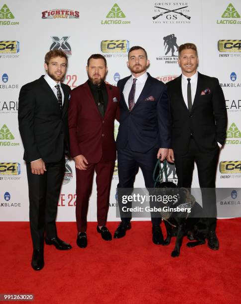 Actors Max Thieriot, A. J. Buckley, Daniel Briggs with his dog Captain and Ethan Lunz attend the 10th annual Fighters Only World Mixed Martial Arts...