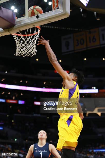 Alana Beard of the Los Angeles Sparks handles the ball against the Connecticut Sun during a WNBA basketball game at Staples Center on July 3, 2018 in...