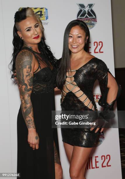 Mixed martial artists Ashlee Evans-Smith and Marie Choi attend the 10th annual Fighters Only World Mixed Martial Arts Awards at Palms Casino Resort...